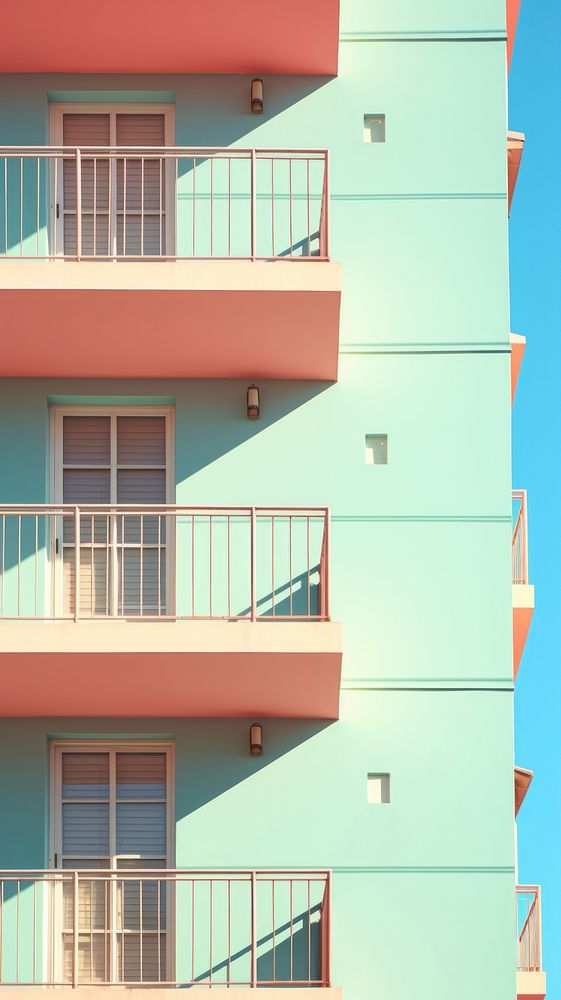 Pastel color apartment building architecture sunlight balcony.