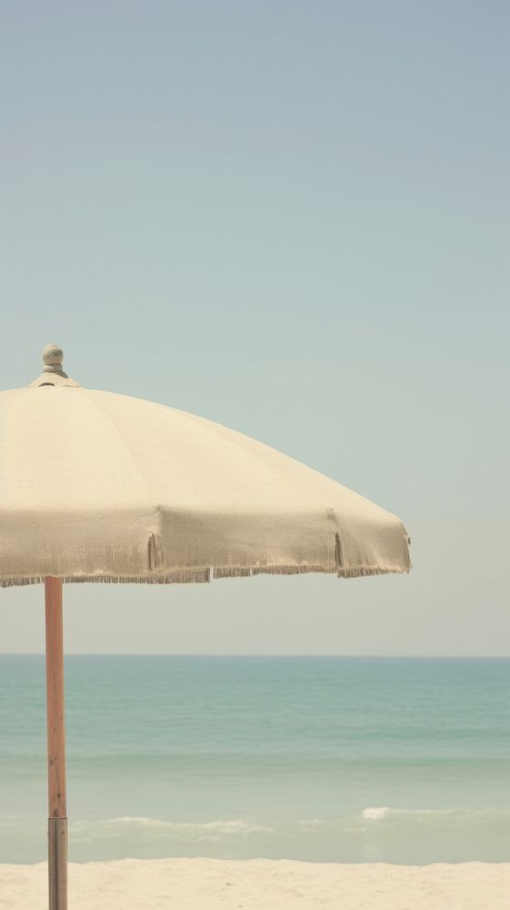 Aesthetic beach umbrella landscape wallpaper outdoors nature ocean.