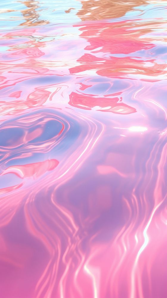 Pink candy water surface with bright sun light reflections backgrounds abstract outdoors.
