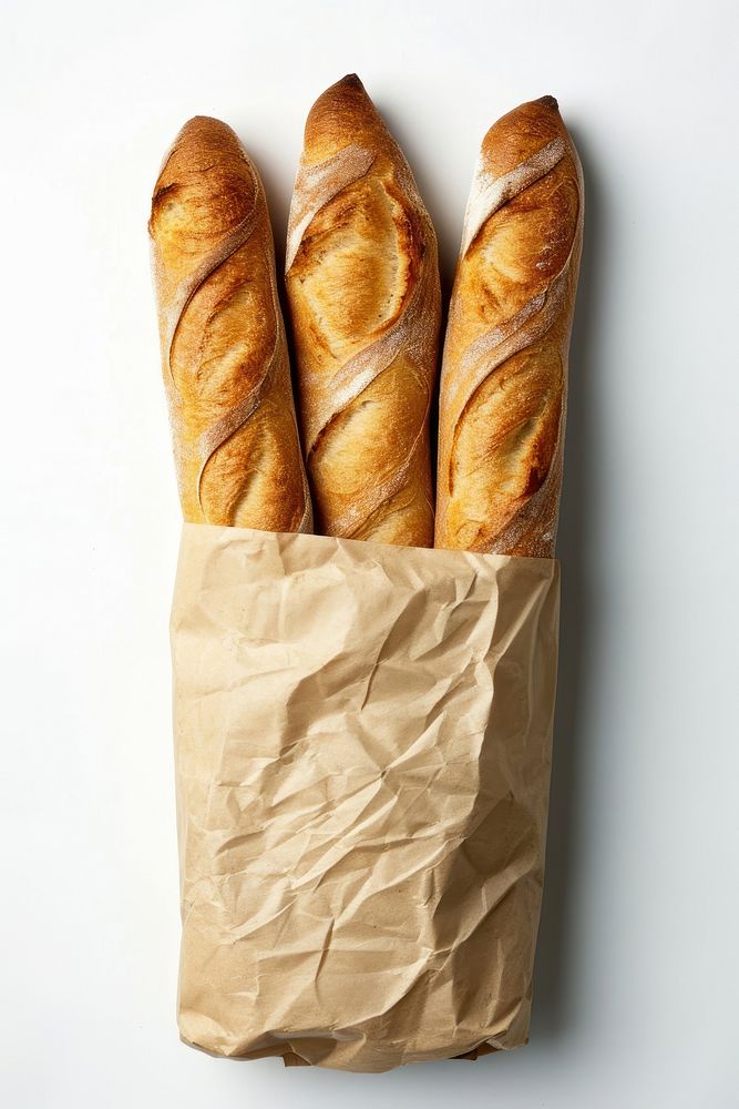A fresh baguette in a paper bag bread food white background.