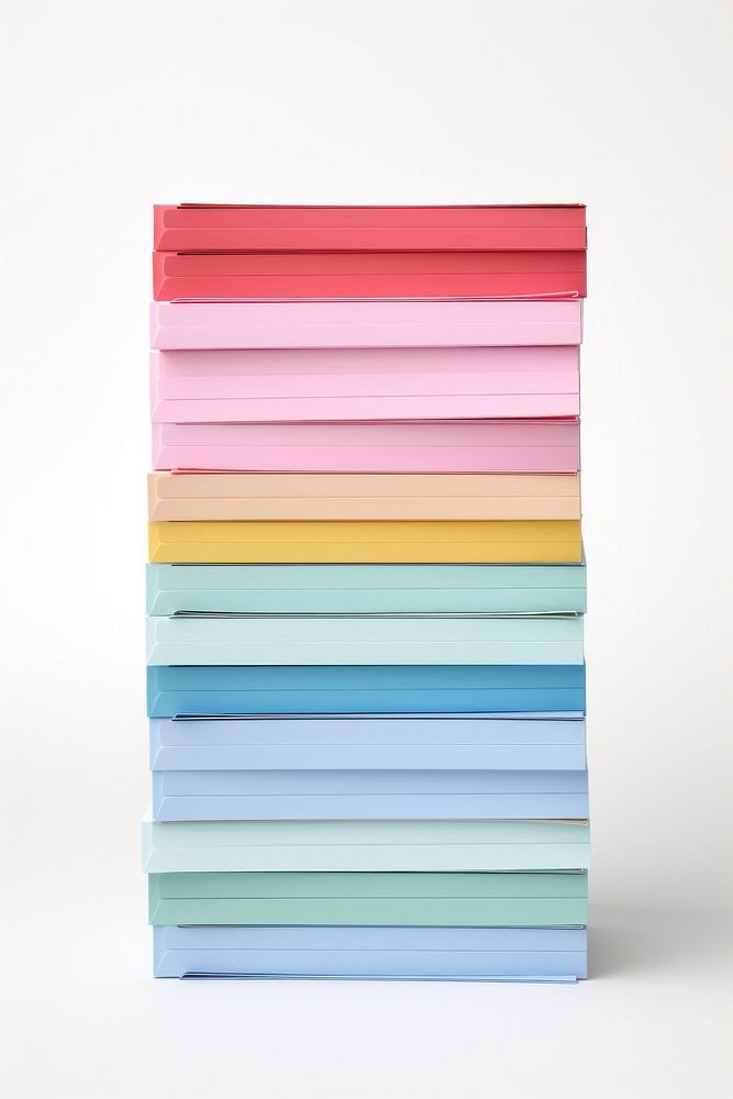 A stack of file folders paper white background publication.