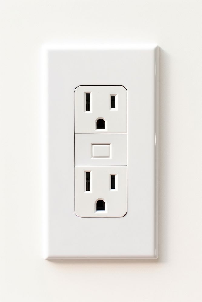 A White Electrical Outlet electrical outlet electricity electronics.