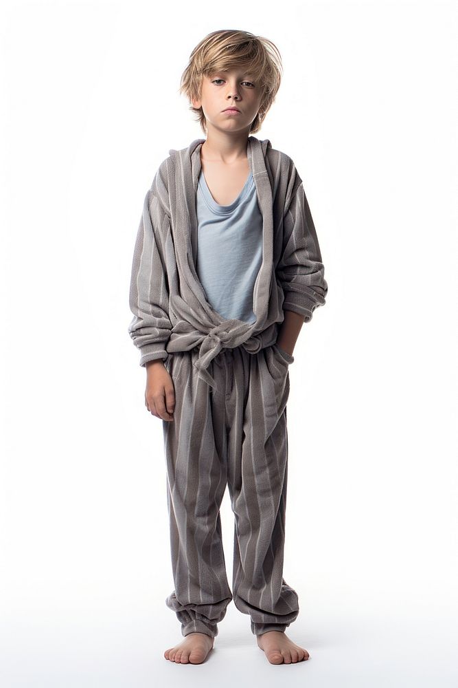 A boy in pajamas white background outerwear portrait.