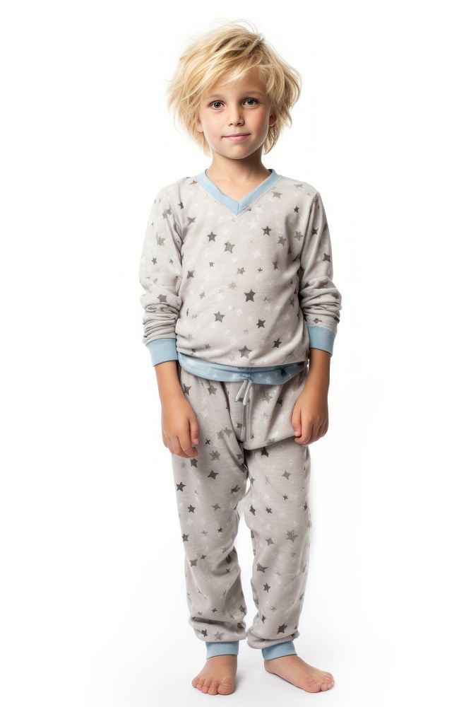 A boy in pajamas white background outerwear innocence.