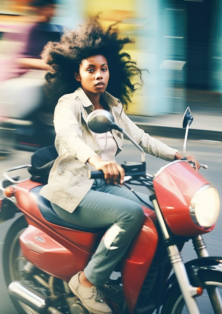 A motion blur black woman riding a motorcycle portrait photography vehicle.