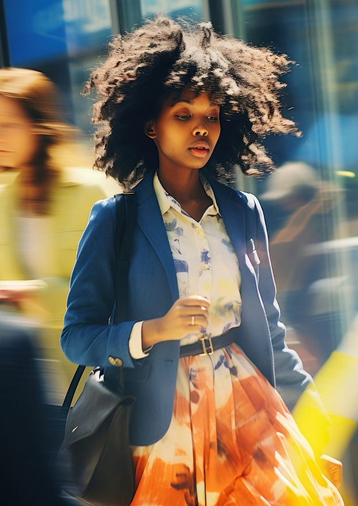 A motion blur black woman going to work portrait photography speed.