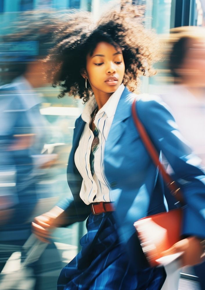 A motion blur black woman going to work portrait photography adult.