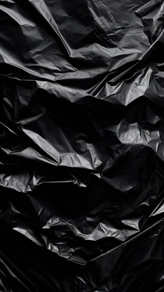 A black trash bag wallpaper white backgrounds monochrome.