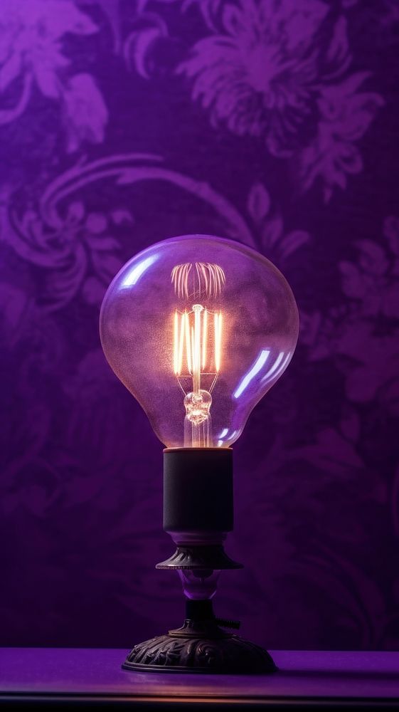  A purple lamp lightbulb wall electricity. 