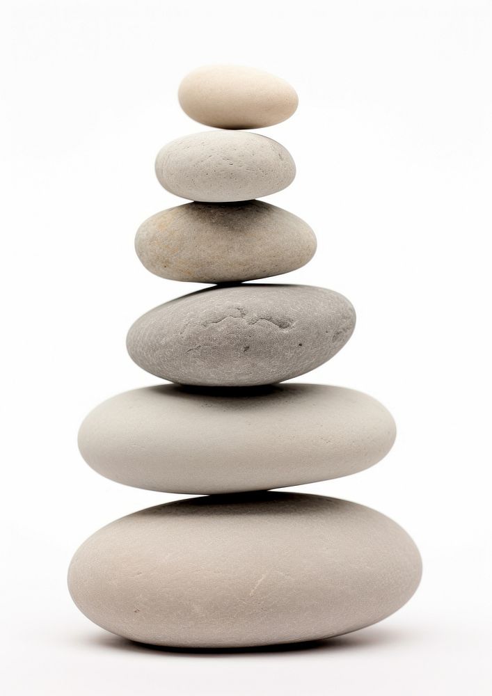 A seven stacked stone pebble white background simplicity.