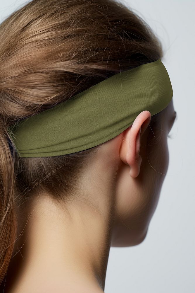 Woman with dull green headband