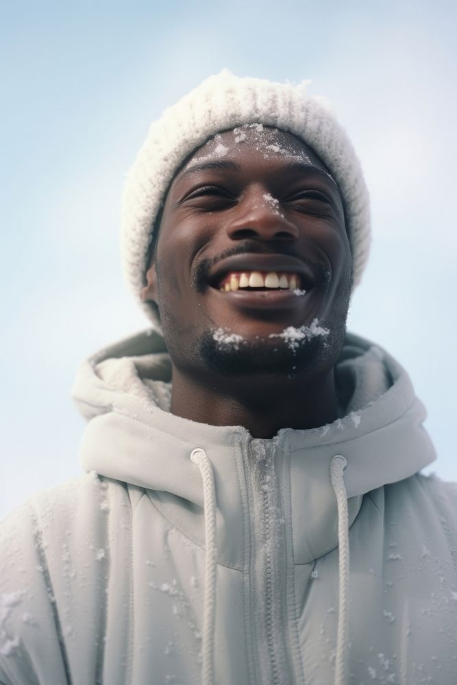 Black men snow portrait outdoors.