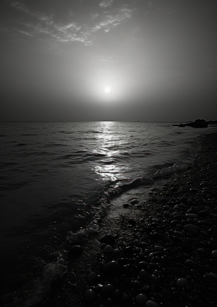 A full moon above the sea outdoors nature beach.