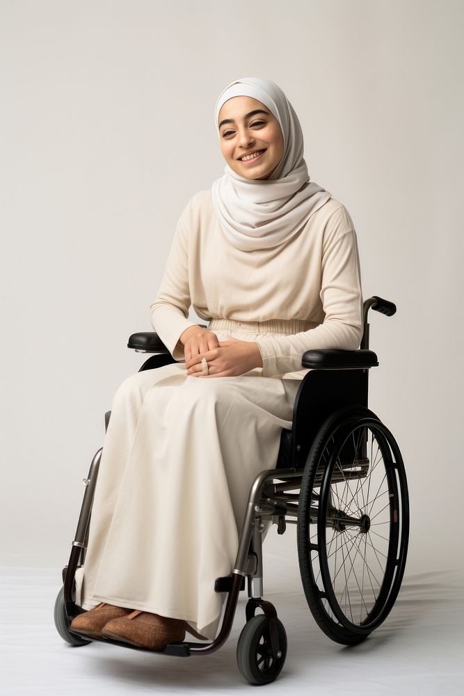 A disabled Iranian woman wheelchair smiling sitting.