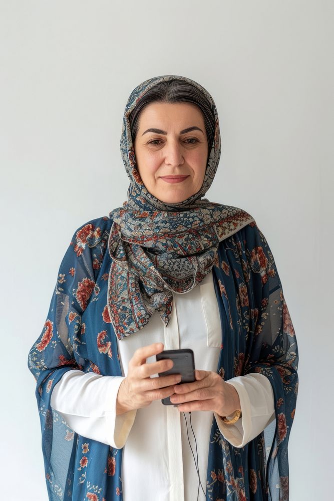 Iranian woman using mobile phone scarf technology headscarf.