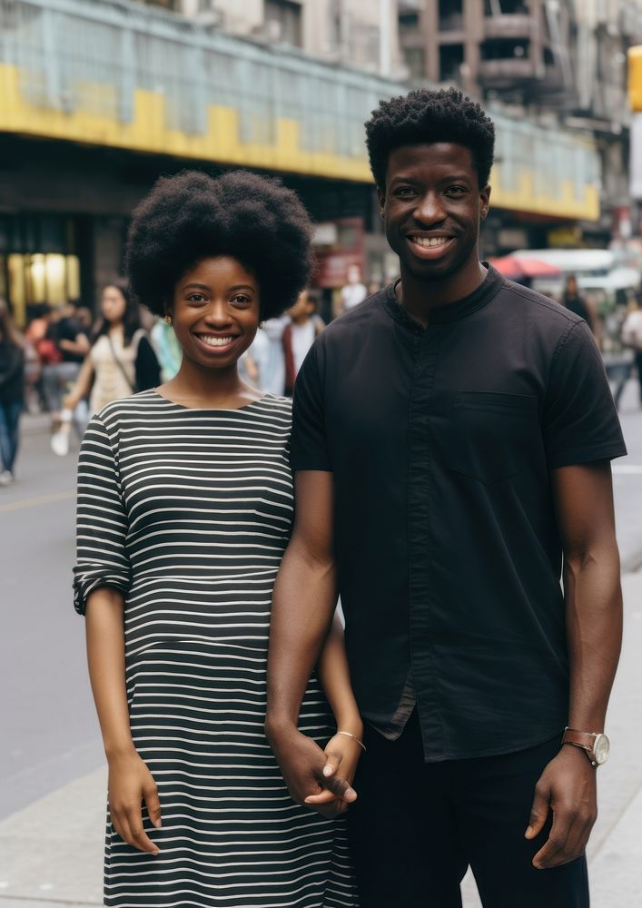 Black man holding hand pregnant black woman portrait street adult.