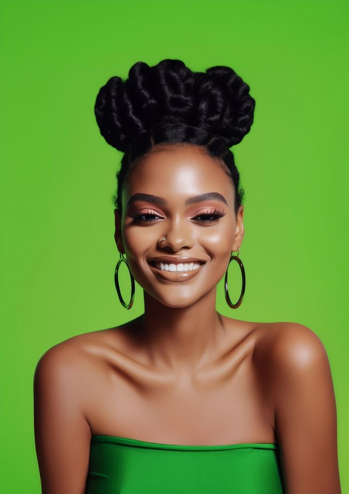 A black woman smile with green cat eye makeup photography portrait fashion.