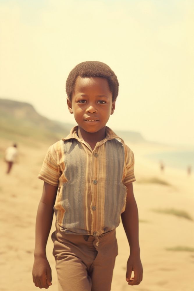 Kid on the beach portrait outdoors nature. AI generated Image by rawpixel.