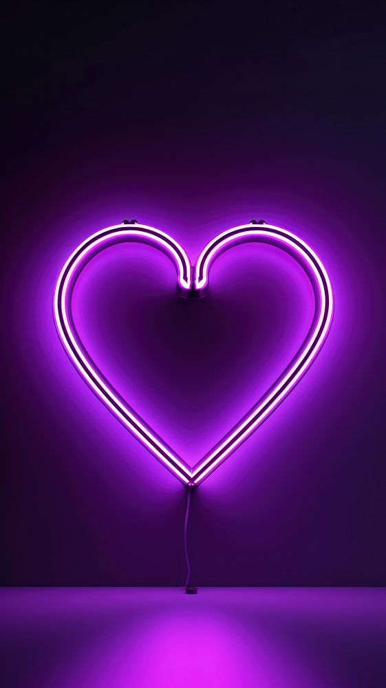  Purple neon heart light shape illuminated. AI generated Image by rawpixel.