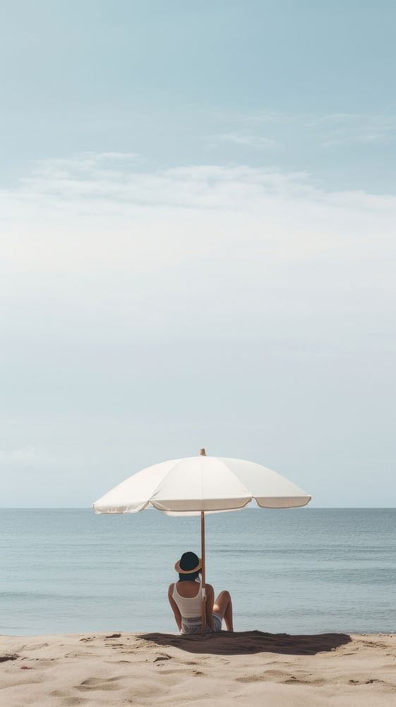  Umbrella ocean outdoors vacation. AI generated Image by rawpixel.