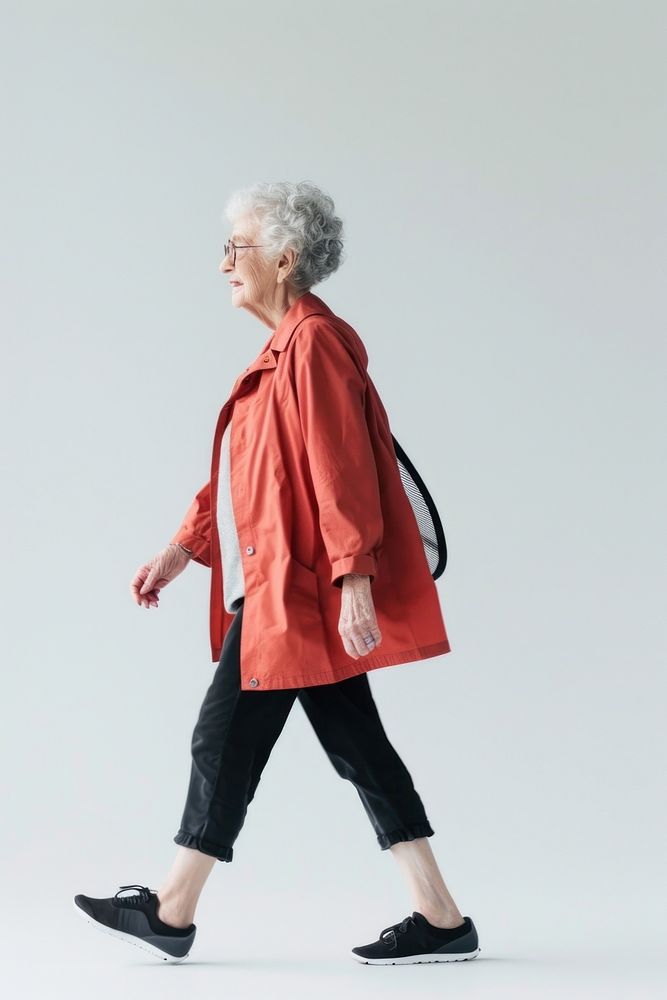 A senior woman footwear raincoat walking.