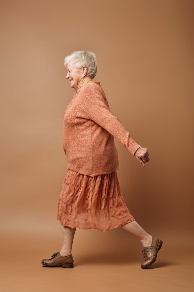 A senior woman footwear portrait sweater.