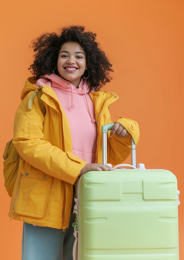 Plus size mixed race teen woman with travel luggage smiling jacket smile.