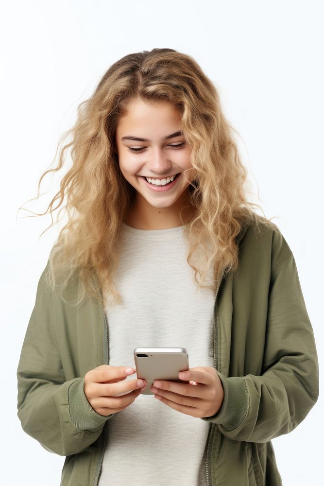 A young woman holding a mobile cellphone looking at the camera portrait smile adult. AI generated Image by rawpixel.