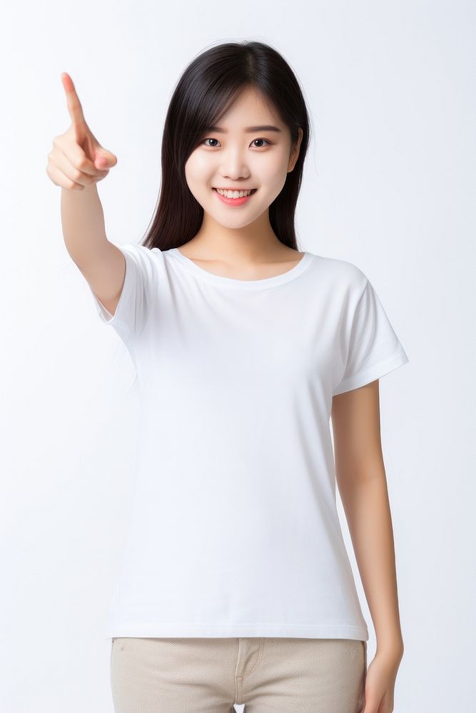 A Young woman pointing finger at herself and blank white tshirt portrait t-shirt sleeve. AI generated Image by rawpixel.