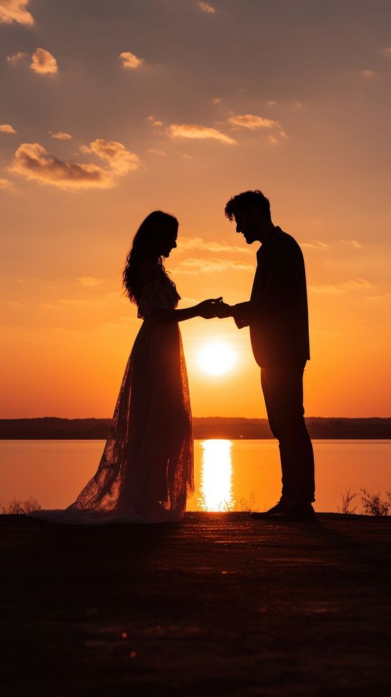  Man ask a woman to marry him during the sunset wedding backlighting outdoors. AI generated Image by rawpixel.