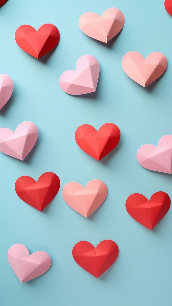  Paper crafted hearts backgrounds celebration abundance. AI generated Image by rawpixel.