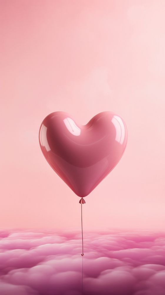  Pink heart balloon celebration mid-air helium. 