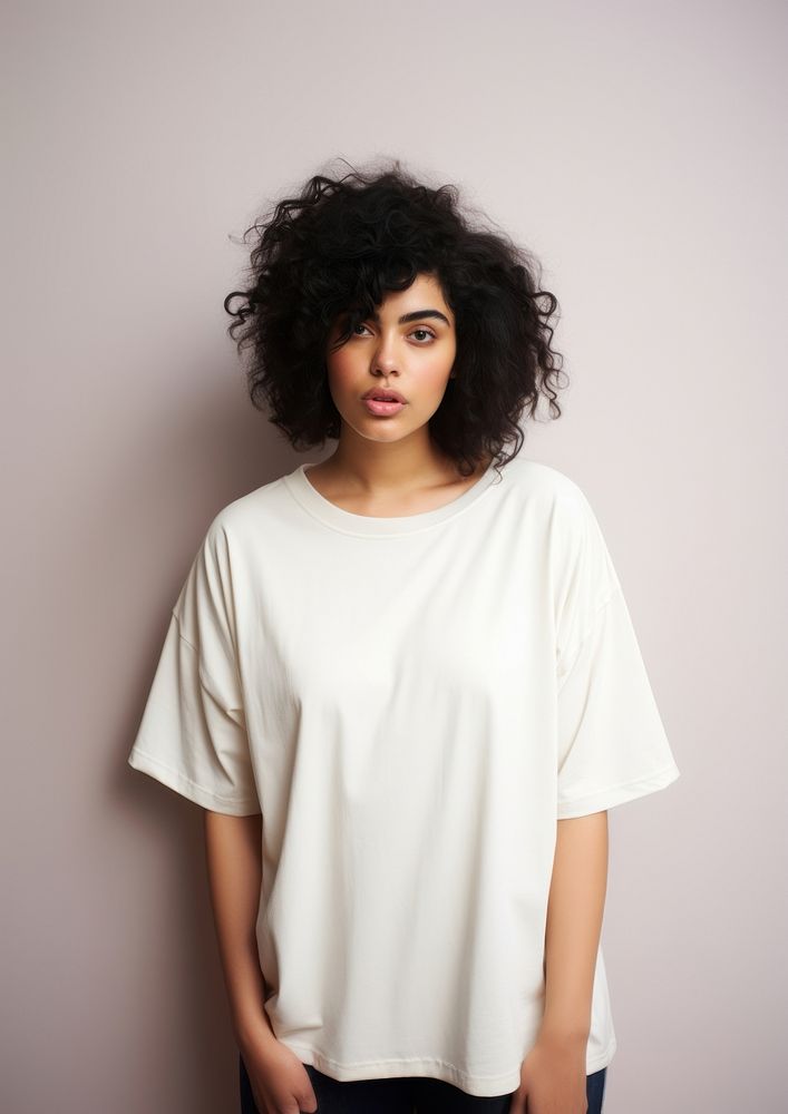 Cream oversized t-shirt  portrait fashion sleeve.