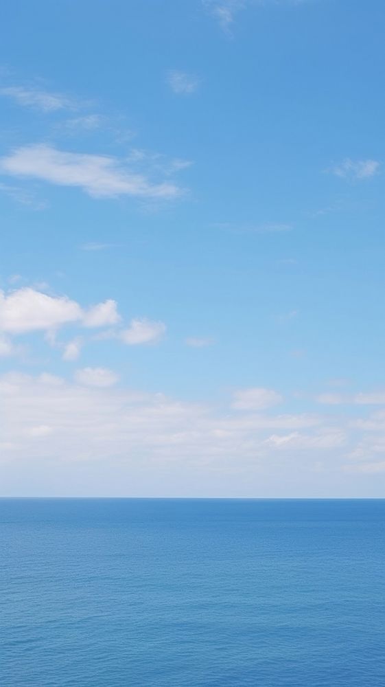 Aesthetic ocean and large blue sky landscape wallpaper outdoors horizon nature.