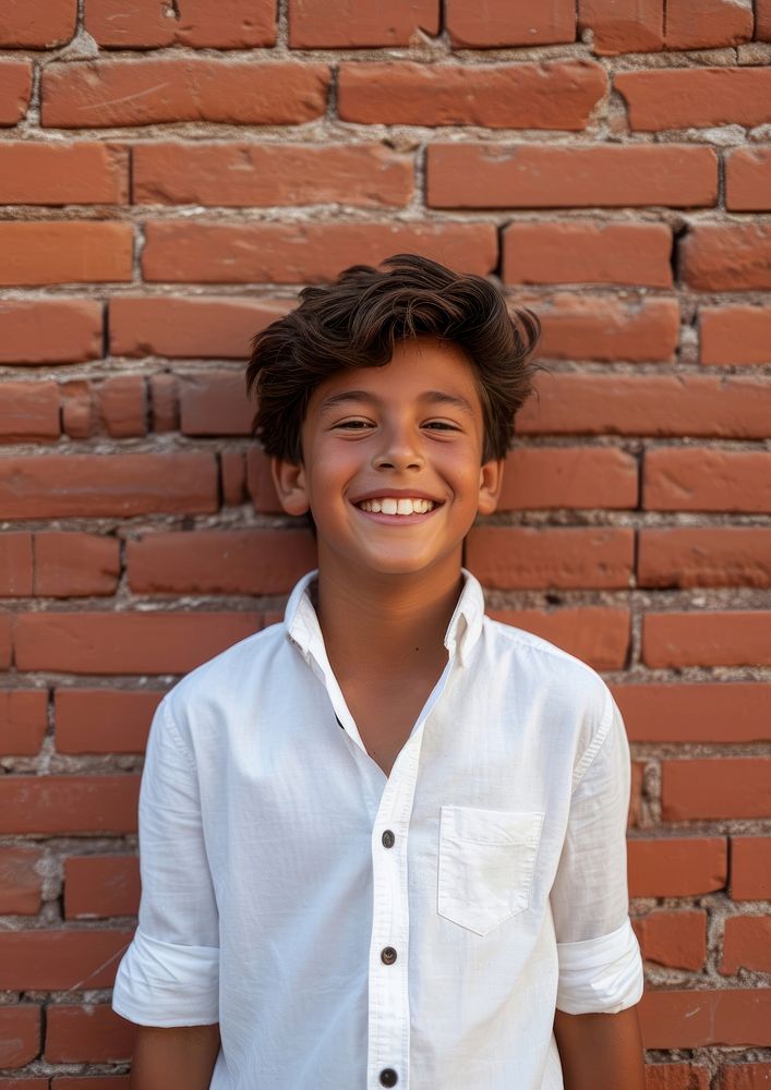 Portrait brick shirt smile.