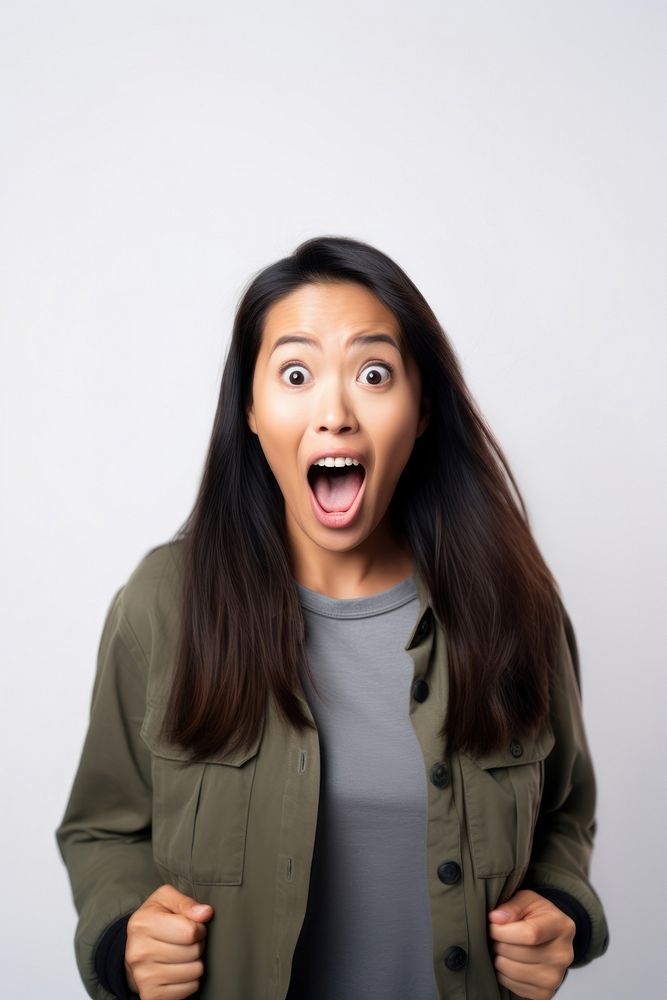 A Young asian woman in casual costume feeling shocked with surprise expression portrait adult photo.