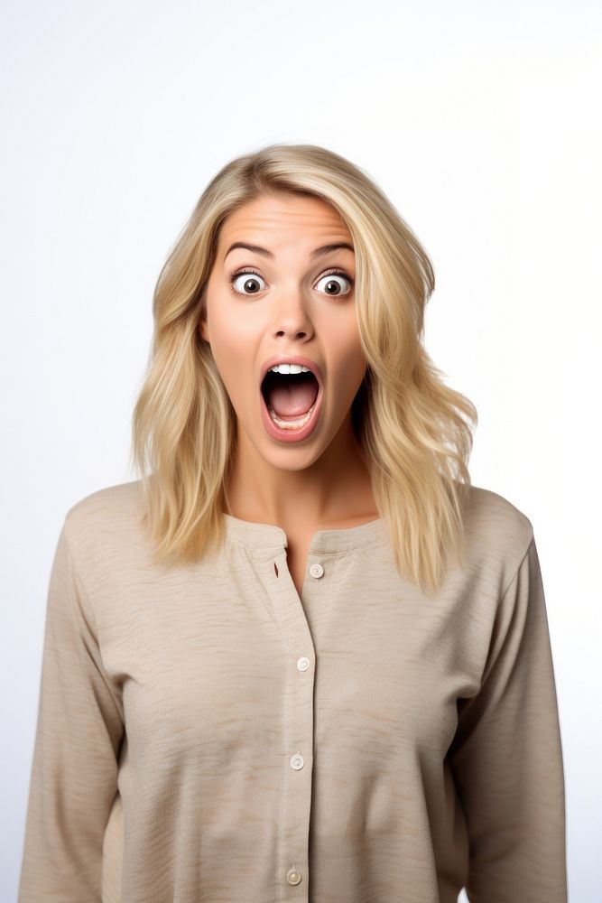 A Young blonde woman in casual costume feeling shocked with surprise expression adult white background frustration.