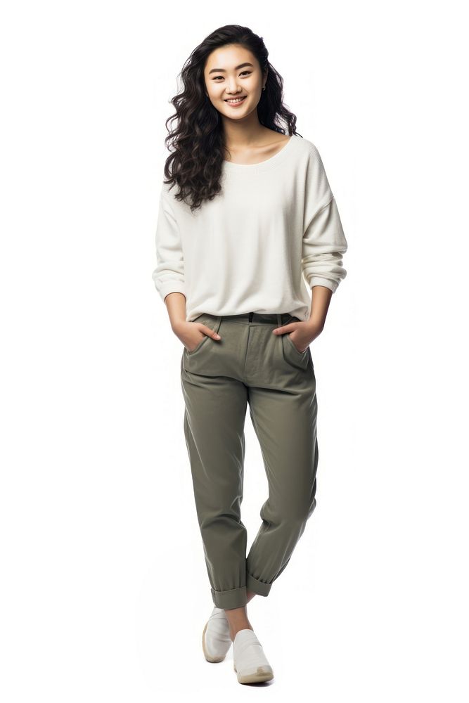An Asian woman wearing casual clothes standing smiling looking.