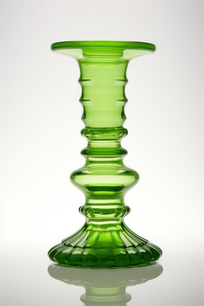 Green retro glass candlestick holder vase white background drinkware.