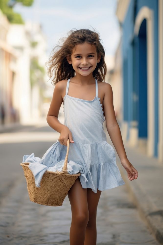 A joyful Cuban little girl holding shopping basket child architecture hairstyle.
