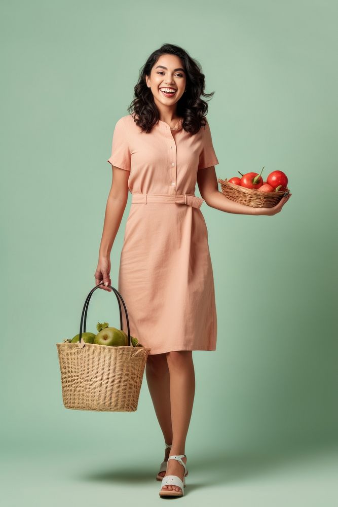 A joyful Hispanic woman holding shopping basket adult hairstyle container.
