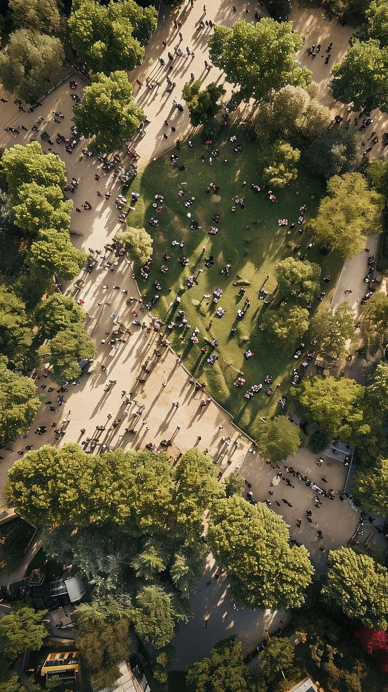 Aerial top down view of crowded park architecture outdoors vehicle.