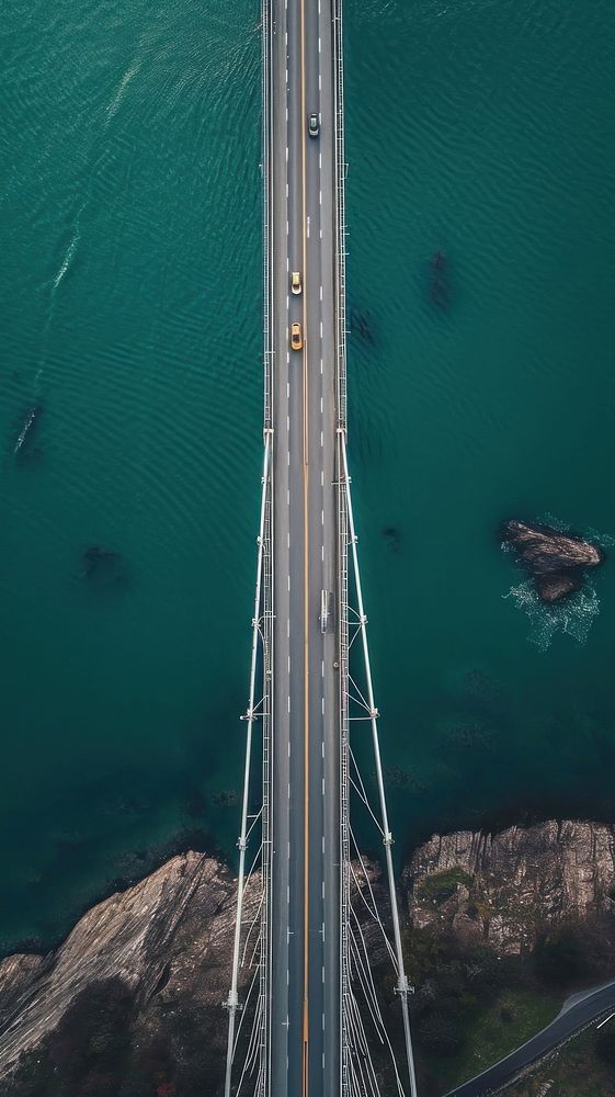 Aerial top down view of stunning bridge outdoors road infrastructure.