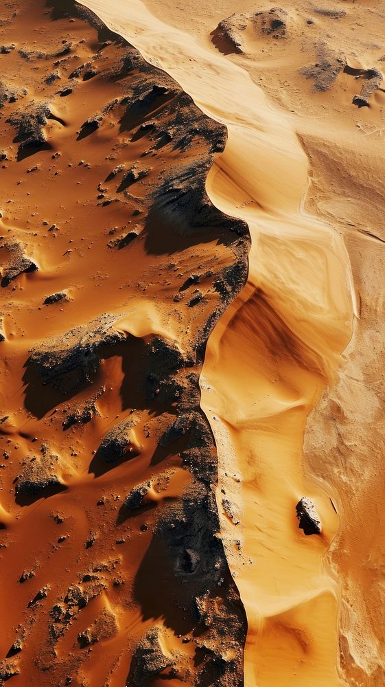 Aerial top down view of stunning dune landscape outdoors desert.