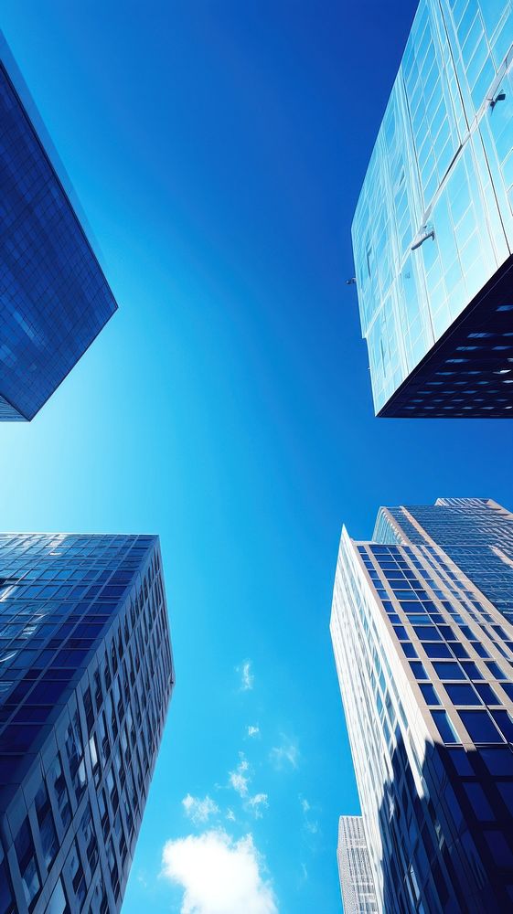  Business buildings against blue sky photo cityscape architecture outdoors. AI generated Image by rawpixel.