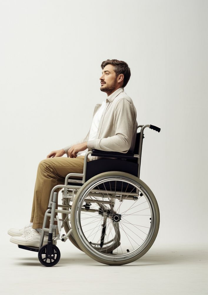 A man on wheelchair sitting person adult. AI generated Image by rawpixel.
