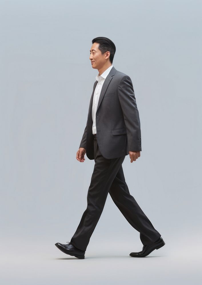 A chinese businessman walking footwear tuxedo. AI generated Image by rawpixel.