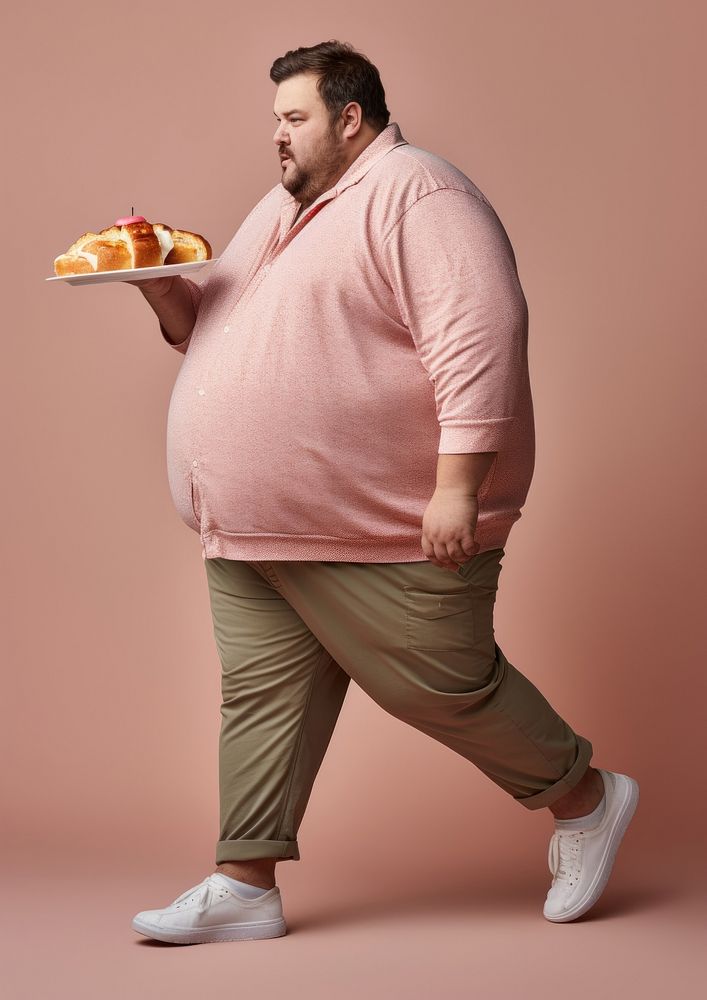 A chubby man eating berger person adult human. AI generated Image by rawpixel.