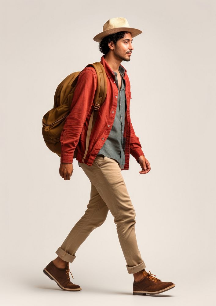 A happy hispanic traveler walking backpack person. AI generated Image by rawpixel.
