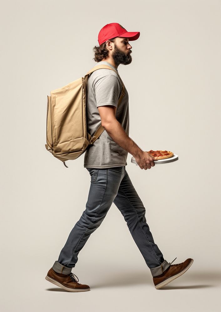 A pizza delivery man walking person adult. AI generated Image by rawpixel.
